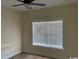 Bright bedroom featuring modern ceiling fan, neutral walls, wood flooring and natural light at 3162 Wayside Rd., Conway, SC 29527