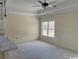 Bright living room with large window and coffered ceiling at 3162 Wayside Rd., Conway, SC 29527