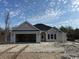 Charming single-story home featuring a two-car garage and neutral siding at 3174 Wayside Rd., Conway, SC 29527