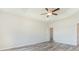 Well-lit bedroom with ceiling fan and wood-look flooring at 3340 Little Bay Dr., Conway, SC 29526