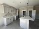 Modern kitchen with white countertops and gray cabinets at 487 Highway 348, Loris, SC 29569