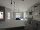 Modern kitchen with white countertops and gray cabinets at 487 Highway 348, Loris, SC 29569