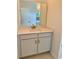 Bathroom vanity with white cabinets, quartz countertop, rectangular mirror, and modern gold faucet at 8640 Farrier Dr., Myrtle Beach, SC 29588
