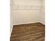 An empty closet with wooden floors and wire shelving at 8640 Farrier Dr., Myrtle Beach, SC 29588