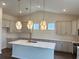 Bright kitchen featuring a large island, pendant lights, and stainless steel appliances at 8640 Farrier Dr., Myrtle Beach, SC 29588