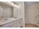 Modern bathroom with double sinks, quartz countertop, and decorative lighting at 8648 Farrier Dr., Myrtle Beach, SC 29588