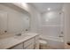 Bright bathroom featuring a vanity with a white countertop and a bathtub at 8648 Farrier Dr., Myrtle Beach, SC 29588