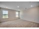 Spacious bedroom with plush carpeting and abundant natural light at 8648 Farrier Dr., Myrtle Beach, SC 29588
