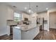 Modern kitchen featuring stainless steel appliances, an island, and granite countertops at 8648 Farrier Dr., Myrtle Beach, SC 29588