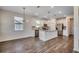 Well-lit kitchen with granite countertops, stainless steel appliances, and stylish pendant lighting at 8648 Farrier Dr., Myrtle Beach, SC 29588