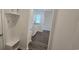 Hallway featuring storage with a convenient bench and coat hooks, leading to other areas of the home at 8652 Farrier Dr., Myrtle Beach, SC 29588