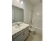 Bathroom featuring a single sink vanity, a toilet, and a tub/shower combination at 8663 Farrier Dr., Myrtle Beach, SC 29588