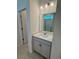 Bathroom with a light gray vanity with granite countertop and shower with a glass door at 8663 Farrier Dr., Myrtle Beach, SC 29588