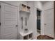 Mudroom with storage bench, baskets and coat hooks at 8663 Farrier Dr., Myrtle Beach, SC 29588