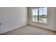 Bright bedroom featuring a window with a view of the neighborhood at 8667 Farrier Dr., Myrtle Beach, SC 29588