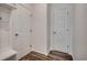 Foyer featuring modern doors, and vinyl flooring, offering a welcoming and practical entryway space at 8667 Farrier Dr., Myrtle Beach, SC 29588