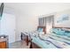 Bright bedroom with two beds, a TV, and beach-themed decor at 9581 Shore Dr. # 132, Myrtle Beach, SC 29572