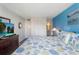 Bright bedroom with a large bed, dresser with TV, and modern decor provides comfort at 9581 Shore Dr. # 132, Myrtle Beach, SC 29572