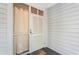 Welcoming entrance with a stylish white door and easy access to the residence with screen door for airflow at 9581 Shore Dr. # 132, Myrtle Beach, SC 29572