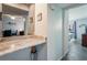 Hallway with stone countertop and view into bedroom at 9581 Shore Dr. # 132, Myrtle Beach, SC 29572