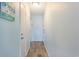 Hallway features doors leading to rooms and decor for beach lovers at 9581 Shore Dr. # 132, Myrtle Beach, SC 29572