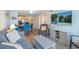 Relaxing living space with modern furnishings, an open layout, and seamless connection to the adjacent kitchen area at 9581 Shore Dr. # 132, Myrtle Beach, SC 29572
