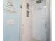 A pristine white marble shower showcases design with built-in shelving for toiletries at 9581 Shore Dr. # 132, Myrtle Beach, SC 29572