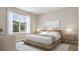 Bedroom with a large window, natural light, and a minimalist design at 4009 Braid Ct., Myrtle Beach, SC 29588