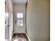 Inviting entryway with wood flooring, a white front door with glass, and neutral wall colors at Tbb1 Farrier Dr., Myrtle Beach, SC 29588