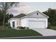 Charming single-story home with a two-car garage, well-manicured lawn, and delightful curb appeal at 4009 Braid Ct., Myrtle Beach, SC 29588