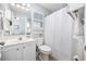 Clean bathroom with white vanity, toilet, and shower at 1672 Langley Dr., Longs, SC 29568