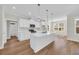Kitchen featuring a large island, stainless steel appliances, and ample cabinet space for modern functionality and style at 2588 Lake Vista Dr., Little River, SC 29566