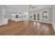 Spacious living room with hardwood floors, fan, recessed lighting, and light walls at 2588 Lake Vista Dr., Little River, SC 29566