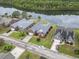Waterfront homes with manicured lawns line this quiet community with a lake at 1066 Brentford Pl., Myrtle Beach, SC 29579
