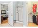 Bright bathroom featuring a glass shower and walk in closet next to the main bedroom at 1066 Brentford Pl., Myrtle Beach, SC 29579
