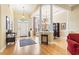 Grand home entrance with soaring ceilings, hardwood floors, and elegant decor at 1066 Brentford Pl., Myrtle Beach, SC 29579