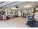 Spacious garage with ample storage and a white refrigerator in the corner at 1066 Brentford Pl., Myrtle Beach, SC 29579