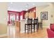 Open concept kitchen with wooden cabinets, a breakfast bar, and a casual dining area at 1066 Brentford Pl., Myrtle Beach, SC 29579