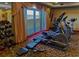 Well-equipped gym with elliptical machines, weights, and a view at 2007 S Ocean Blvd. # 401, Myrtle Beach, SC 29577
