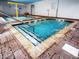 Indoor pool with brick decking, a water feature, and multiple depths at 2007 S Ocean Blvd. # 401, Myrtle Beach, SC 29577