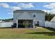 Large backyard with a screened in porch, grill, and a spacious yard perfect for entertaining at 276 Palmetto Glen Dr., Myrtle Beach, SC 29588