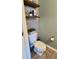 Nicely decorated half-bathroom with unique wallpaper, open shelves and nice decor at 276 Palmetto Glen Dr., Myrtle Beach, SC 29588