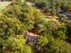 Aerial view of cozy home surrounded by lush trees near a beautiful golf course at 3034 Oak Grove Bend # 34 Ar, Murrells Inlet, SC 29576