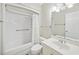 A bright bathroom with shower and tub combination, new fixtures and tile flooring at 3034 Oak Grove Bend # 34 Ar, Murrells Inlet, SC 29576