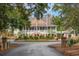 Beautiful clubhouse with inviting porch and manicured landscaping, a perfect gathering spot at 3034 Oak Grove Bend # 34 Ar, Murrells Inlet, SC 29576