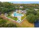 Aerial shot of the community pool area featuring a large pool, spa, and surrounding greenery at 3034 Oak Grove Bend # 34 Ar, Murrells Inlet, SC 29576