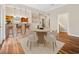 Cozy dining area with modern lighting fixtures and convenient access to the kitchen at 3034 Oak Grove Bend # 34 Ar, Murrells Inlet, SC 29576