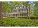 Charming two-story home featuring a wide front porch and traditional design at 3034 Oak Grove Bend # 34 Ar, Murrells Inlet, SC 29576