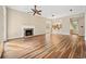 Open-concept living area features a fireplace and seamless flow to kitchen at 3034 Oak Grove Bend # 34 Ar, Murrells Inlet, SC 29576