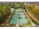 Aerial shot of well-maintained tennis courts offering a great recreational amenity at 3034 Oak Grove Bend # 34 Ar, Murrells Inlet, SC 29576